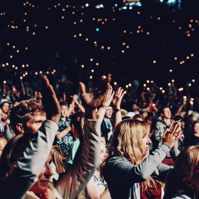 An excited crowd at an event - an example of engaging experience design