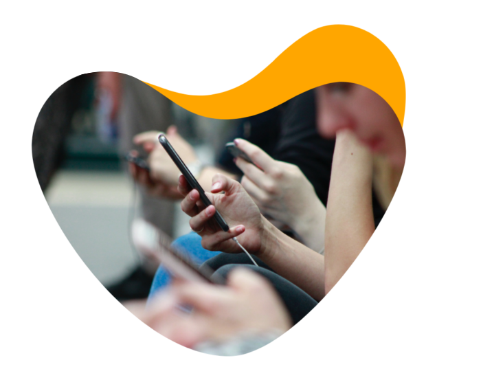 A group of attendees engage with event content using their mobile event apps