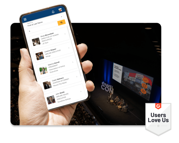 A hand holding a mobile phone while at an in-person event, the mobile phone shows a filtered attendee list, and a G2 badge showing that users love using EventMobi