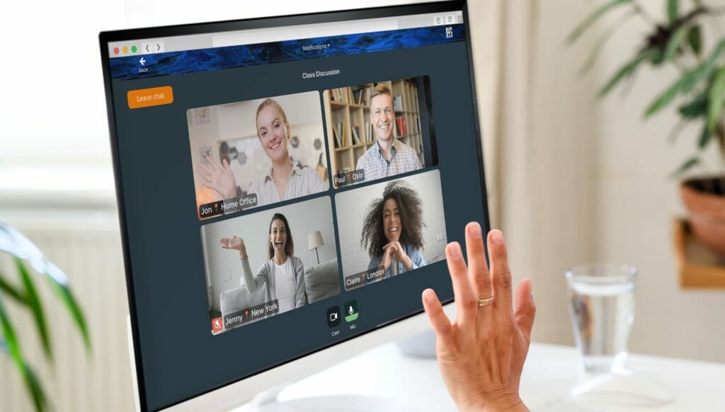 4 people waving and talking to each other in an EventMobi interactive Breakout Room