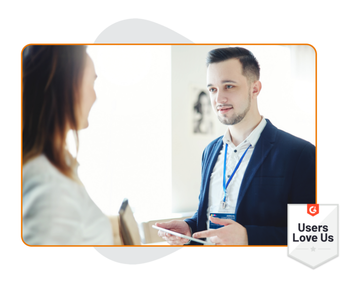 On-site Event Technology Specialist assisting event attendee